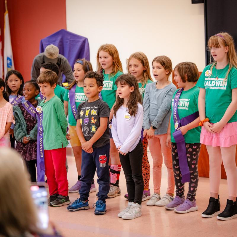 Group of children singing.