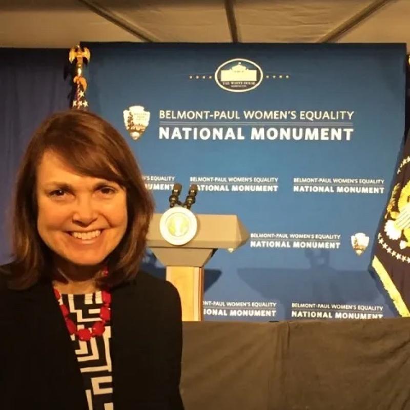 Woman stands in White House Press Room.